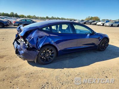 Trzecie zdjęcie samochodu z tyłu: 2018 TESLA MODEL 3 VIN:5YJ3E1EB7JF054767 - miniatura