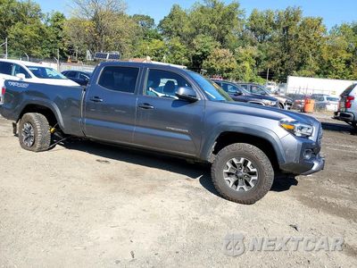 Czwarte zdjęcie samochodu z boku: 2023 TOYOTA TACOMA TRD OFF-ROAD VIN:3TYDZ5BN5PT025792 - miniatura