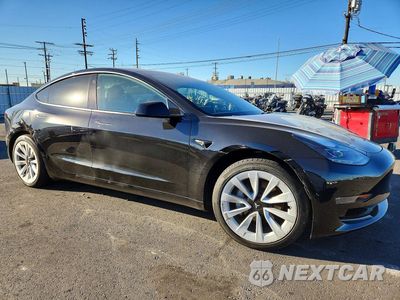 Czwarte zdjęcie samochodu z boku: 2023 TESLA MODEL 3 VIN:5YJ3E1EA1PF650344 - miniatura