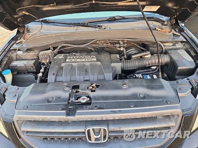 Zdjęcie 12 z 13 samochodu: 2005 HONDA PILOT EX VIN:5FNYF18425B061468 - miniatura