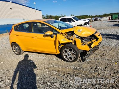 Czwarte zdjęcie samochodu z boku: 2011 FORD FIESTA SES VIN:3FADP4FJ1BM173620 - miniatura