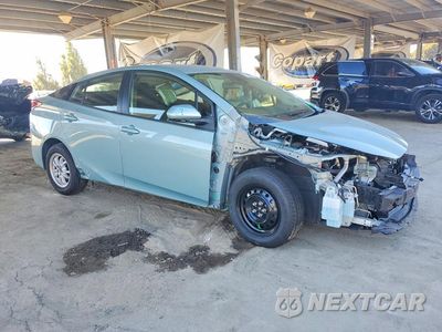 Czwarte zdjęcie samochodu z boku: 2021 TOYOTA PRIUS L ECO VIN:JTDKAMFU2M3133838 - miniatura