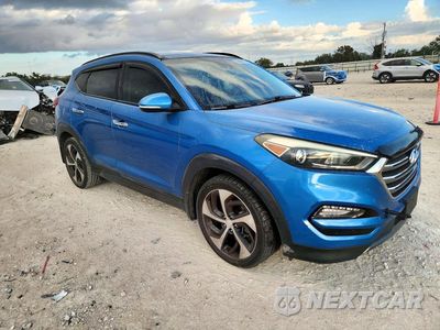 Czwarte zdjęcie samochodu z boku: 2016 HYUNDAI TUCSON LIMITED VIN:KM8J33A23GU198469 - miniatura