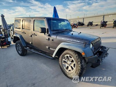 Czwarte zdjęcie samochodu z boku: 2014 JEEP WRANGLER UNLIMITED RUBICON VIN:1C4BJWFG8EL274937 - miniatura