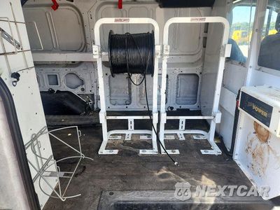 Zdjęcie 11 z 14 samochodu: 2017 FORD TRANSIT T-150 VIN:1FTYE1ZM5HKA69377 - miniatura