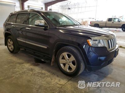 Czwarte zdjęcie samochodu z boku: 2013 JEEP GRAND CHEROKEE LAREDO VIN:1C4RJFAG7DC503323 - miniatura
