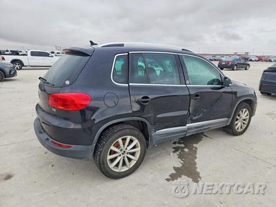 Trzecie zdjęcie samochodu z tyłu: 2017 VOLKSWAGEN TIGUAN WOLFSBURG VIN:WVGSV7AX2HK004562 - miniatura