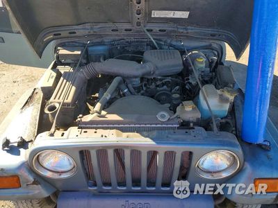 Zdjęcie 12 z 13 samochodu: 1998 JEEP WRANGLER / TJ SE VIN:1J4FY29P2WP745597 - miniatura