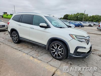 Czwarte zdjęcie samochodu z boku: 2019 HONDA PILOT TOURING VIN:5FNYF5H62KB001839 - miniatura