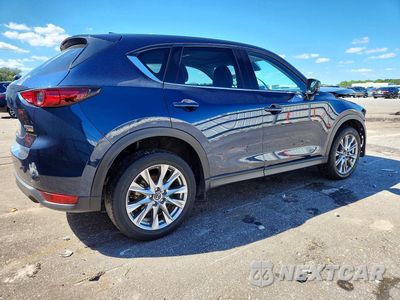 Trzecie zdjęcie samochodu z tyłu: 2021 MAZDA CX-5 GRAND TOURING VIN:JM3KFADM6M0400040 - miniatura