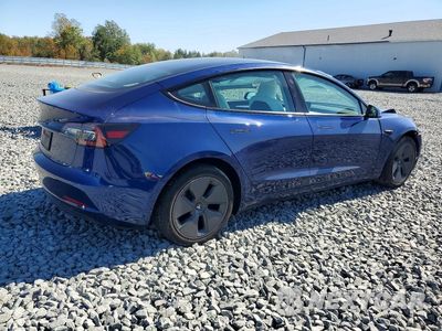 Trzecie zdjęcie samochodu z tyłu: 2023 TESLA MODEL 3 VIN:5YJ3E1EA3PF603123 - miniatura