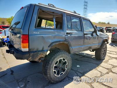 Trzecie zdjęcie samochodu z tyłu: 2001 JEEP CHEROKEE SPORT VIN:1J4FF48S01L593066 - miniatura