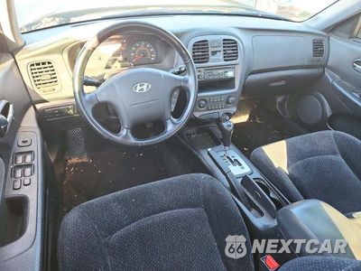 Zdjęcie 8 z 12 samochodu: 2002 HYUNDAI SONATA BASE VIN:KMHWF25HX2A666083 - miniatura