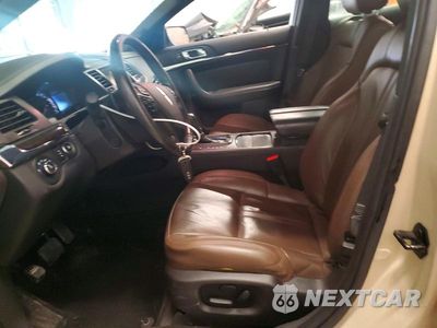 Zdjęcie 7 z 13 samochodu: 2014 LINCOLN MKS VIN:1LNHL9EK7EG611954 - miniatura