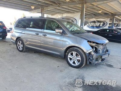 Czwarte zdjęcie samochodu z boku: 2010 HONDA ODYSSEY TOURING VIN:5FNRL3H92AB044765 - miniatura