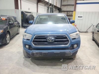 Piąte zdjęcie samochodu w środku: 2019 TOYOTA TACOMA SR5 V6 VIN:3TMCZ5AN5KM238291 - miniatura