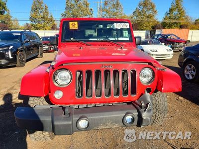 Piąte zdjęcie samochodu w środku: 2017 JEEP WRANGLER SAHARA VIN:1C4GJWBG4HL598256 - miniatura
