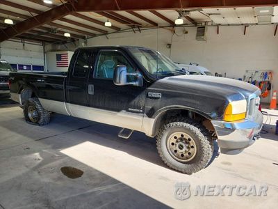 Czwarte zdjęcie samochodu z boku: 2001 FORD F250 SUPER DUTY VIN:1FTNX21F41EB50987 - miniatura