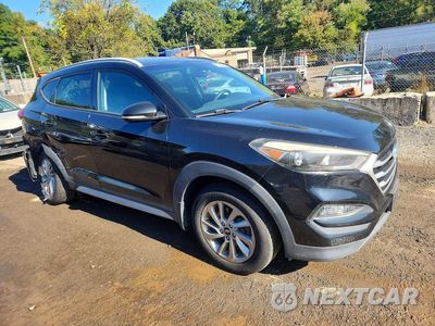 Czwarte zdjęcie samochodu z boku: 2018 HYUNDAI TUCSON SEL PLUS VIN:KM8J3CA40JU646417 - miniatura