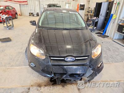 Piąte zdjęcie samochodu w środku: 2014 FORD FOCUS TITANIUM VIN:1FADP3J22EL105181 - miniatura