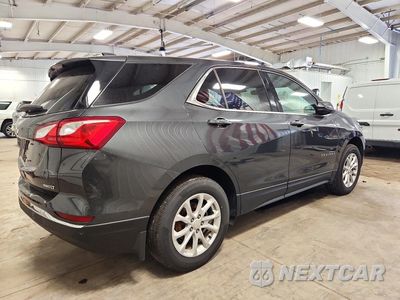 Trzecie zdjęcie samochodu z tyłu: 2018 CHEVROLET EQUINOX LT VIN:3GNAXSEV9JS643626 - miniatura
