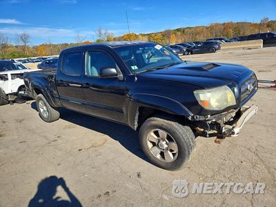 Czwarte zdjęcie samochodu z boku: 2010 TOYOTA TACOMA DOUBLE CAB LONG BED VIN:3TMMU4FN1AM022491 - miniatura