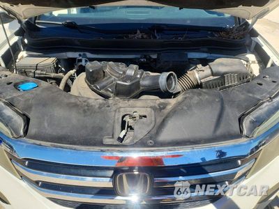 Zdjęcie 12 z 13 samochodu: 2016 HONDA PILOT TOURING VIN:5FNYF5H90GB023341 - miniatura