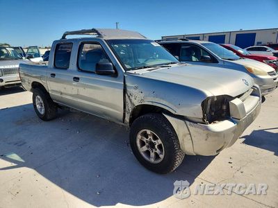 Czwarte zdjęcie samochodu z boku: 2001 NISSAN FRONTIER XE VIN:1N6ED27T71C301626 - miniatura