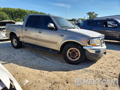 Czwarte zdjęcie samochodu z boku: 2002 FORD F150 SUPERCREW VIN:1FTRW07L52KA94762 - miniatura