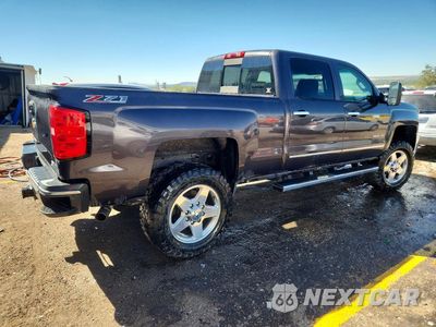 Trzecie zdjęcie samochodu z tyłu: 2015 CHEVROLET SILVERADO K2500 HEAVY DUTY LTZ VIN:1GC1KWEG2FF140189 - miniatura