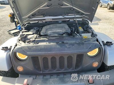Zdjęcie 11 z 13 samochodu: 2014 JEEP WRANGLER SPORT VIN:1C4AJWAG8EL161461 - miniatura