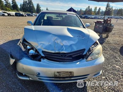 Piąte zdjęcie samochodu w środku: 2003 TOYOTA CAMRY LE VIN:JTDBE32K730181404 - miniatura