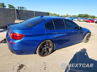 Trzecie zdjęcie samochodu z tyłu: 2016 BMW M5 VIN:WBSFV9C52GG343362 - miniatura