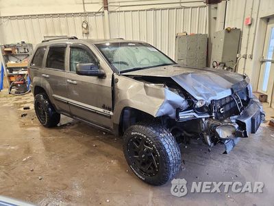 Czwarte zdjęcie samochodu z boku: 2007 JEEP GRAND CHEROKEE LAREDO VIN:1J8GR48K67C600248 - miniatura