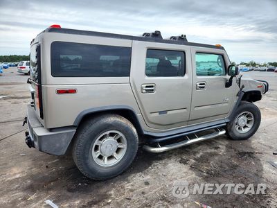 Trzecie zdjęcie samochodu z tyłu: 2003 HUMMER H2 VIN:5GRGN23U63H137636 - miniatura