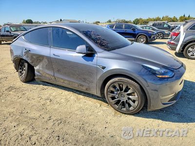 Czwarte zdjęcie samochodu z boku: 2023 TESLA MODEL Y VIN:7SAYGAEE6PF632458 - miniatura