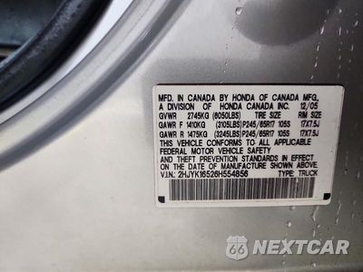 Zdjęcie 12 z 12 samochodu: 2006 HONDA RIDGELINE RTL VIN:2HJYK16526H554856 - miniatura