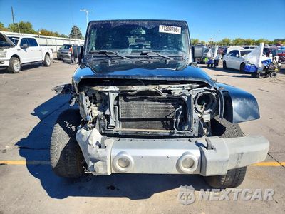 Piąte zdjęcie samochodu w środku: 2014 JEEP WRANGLER UNLIMITED SAHARA VIN:1C4BJWEG4EL247719 - miniatura