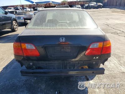 Zdjęcie 6 z 13 samochodu: 2000 HONDA CIVIC LX VIN:JHMEJ6677YS008878 - miniatura