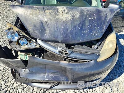 Zdjęcie 12 z 13 samochodu: 2010 TOYOTA SIENNA XLE VIN:5TDYK4CC3AS305193 - miniatura