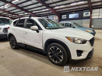 Czwarte zdjęcie samochodu z boku: 2016 MAZDA CX-5 GT VIN:JM3KE4DY3G0715356 - miniatura