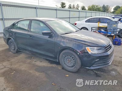 Czwarte zdjęcie samochodu z boku: 2016 VOLKSWAGEN JETTA S VIN:3VW267AJ7GM354495 - miniatura