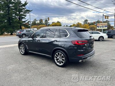 Trzecie zdjęcie samochodu z tyłu: 2021 BMW X5 XDRIVE45E VIN:5UXTA6C00M9E52431 - miniatura