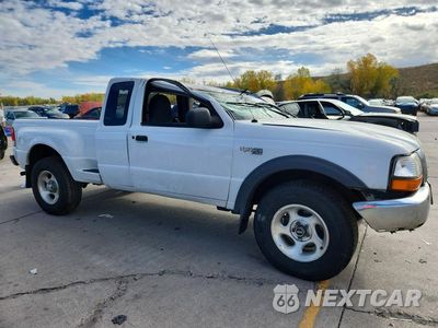 Czwarte zdjęcie samochodu z boku: 1999 FORD RANGER SUPER CAB VIN:1FTZR15X8XTA37900 - miniatura