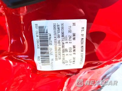 Zdjęcie 12 z 12 samochodu: 2003 MAZDA MX-5 MIATA BASE VIN:JM1NB353030304745 - miniatura