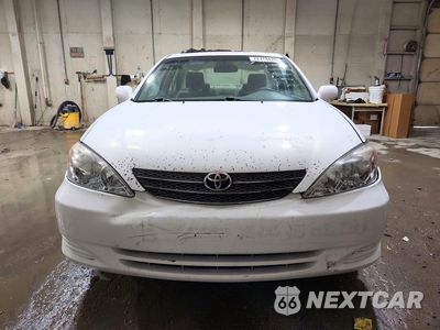Piąte zdjęcie samochodu w środku: 2004 TOYOTA CAMRY LE VIN:4T1BE32K24U294053 - miniatura