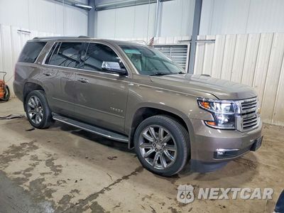 Czwarte zdjęcie samochodu z boku: 2015 CHEVROLET TAHOE K1500 LTZ VIN:1GNSKCKC9FR682402 - miniatura