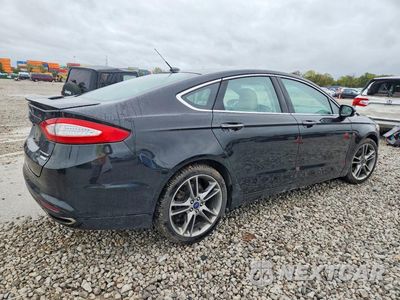 Trzecie zdjęcie samochodu z tyłu: 2016 FORD FUSION TITANIUM VIN:3FA6P0K91GR238456 - miniatura