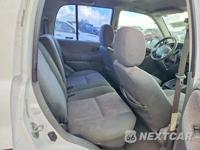 Zdjęcie 11 z 13 samochodu: 2001 CHEVROLET TRACKER VIN:2CNBE13C016903775 - miniatura
