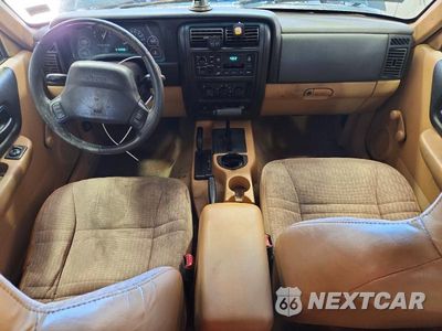 Zdjęcie 8 z 13 samochodu: 1997 JEEP CHEROKEE SE VIN:1J4FJ28S4VL544557 - miniatura